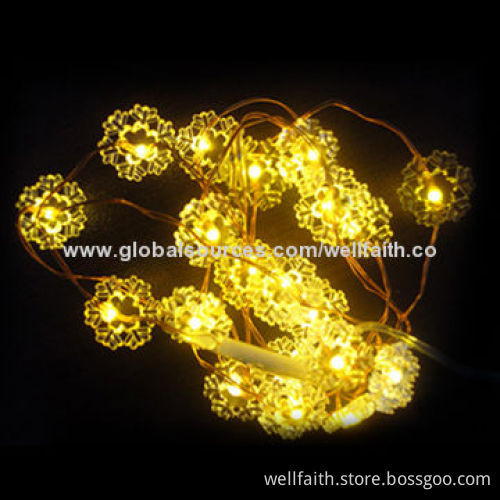 Warm white snow flake shaped fairy LED string lights